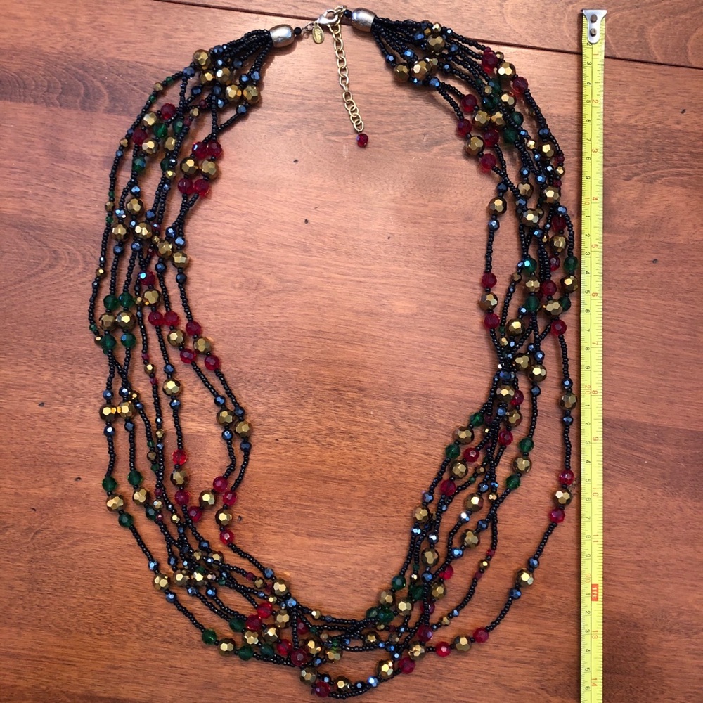 Sparkly, multi strand, jewel toned, adjustable nec
